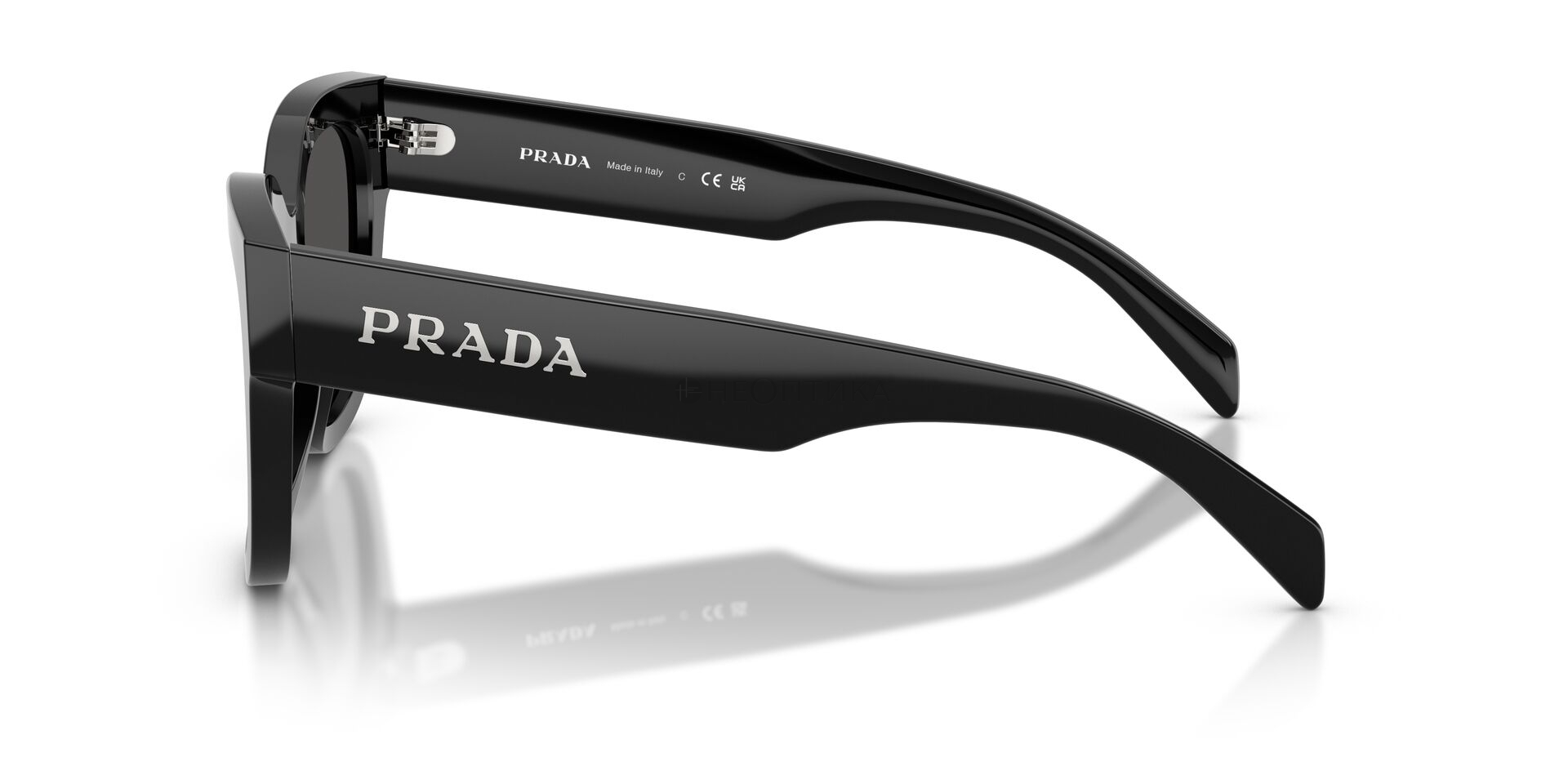 Солнцезащитные очки Prada  0PR C04S 16K08Z 52